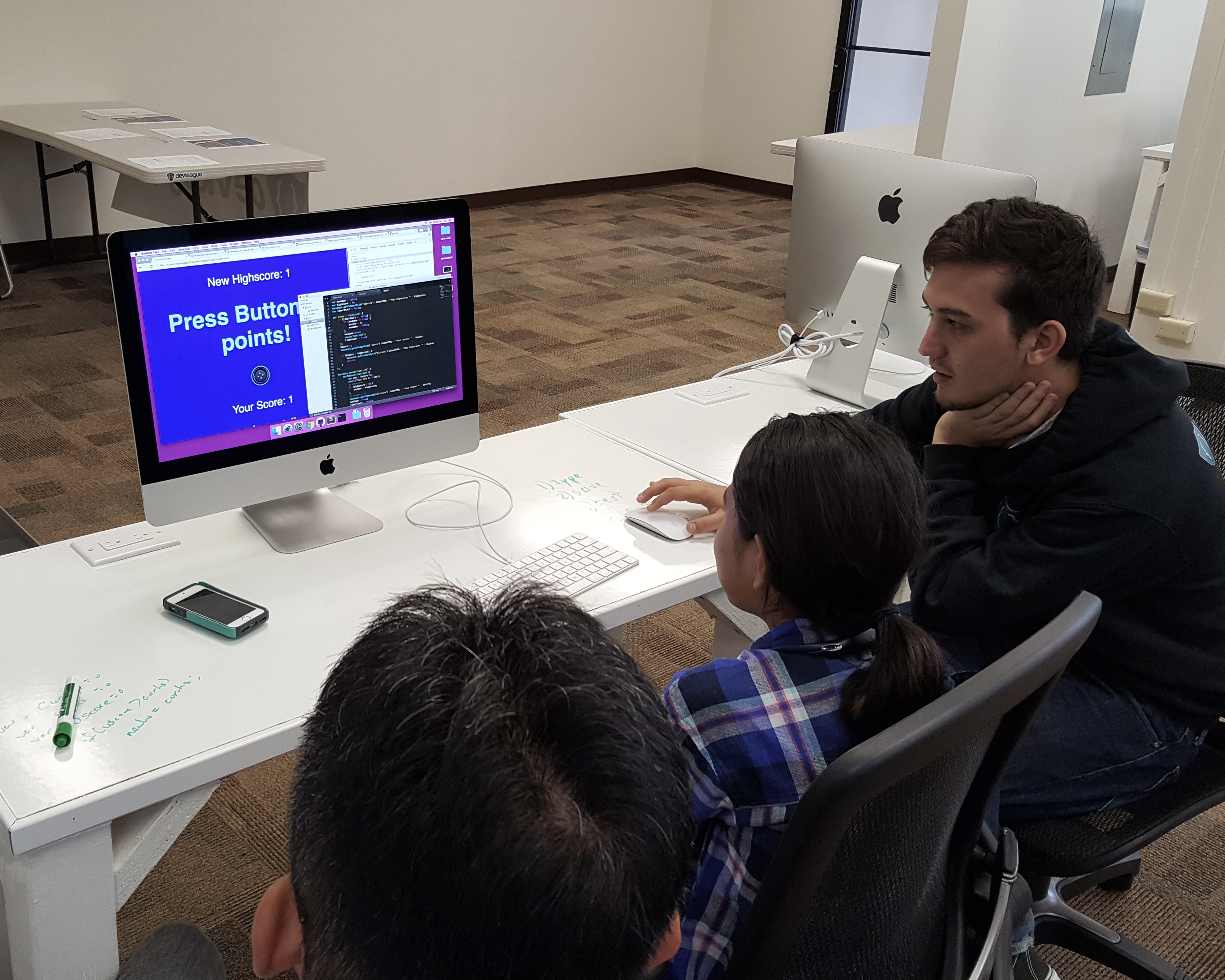 three people coding together - yukio, linds, and dad